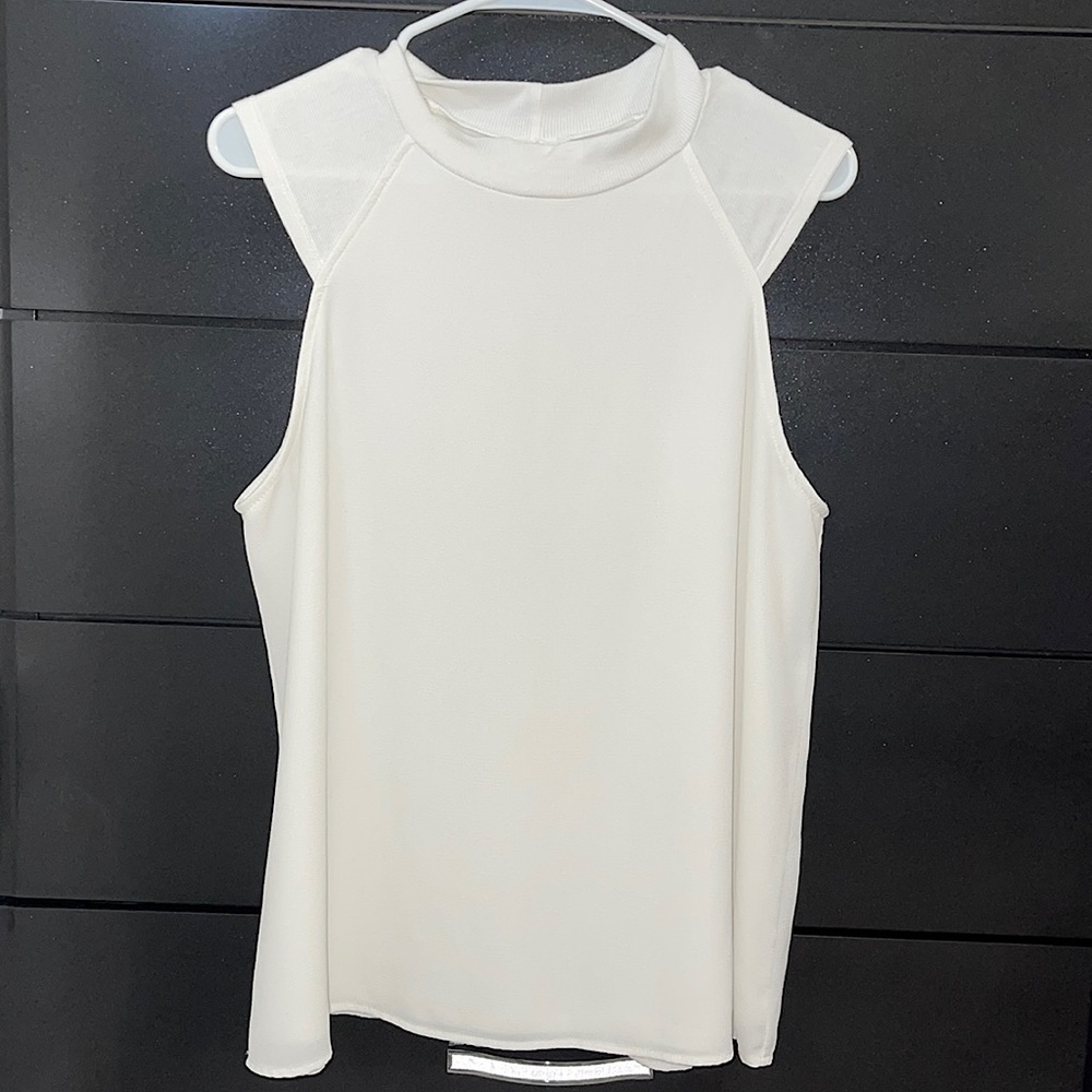 sleeveless turtleneck blouse